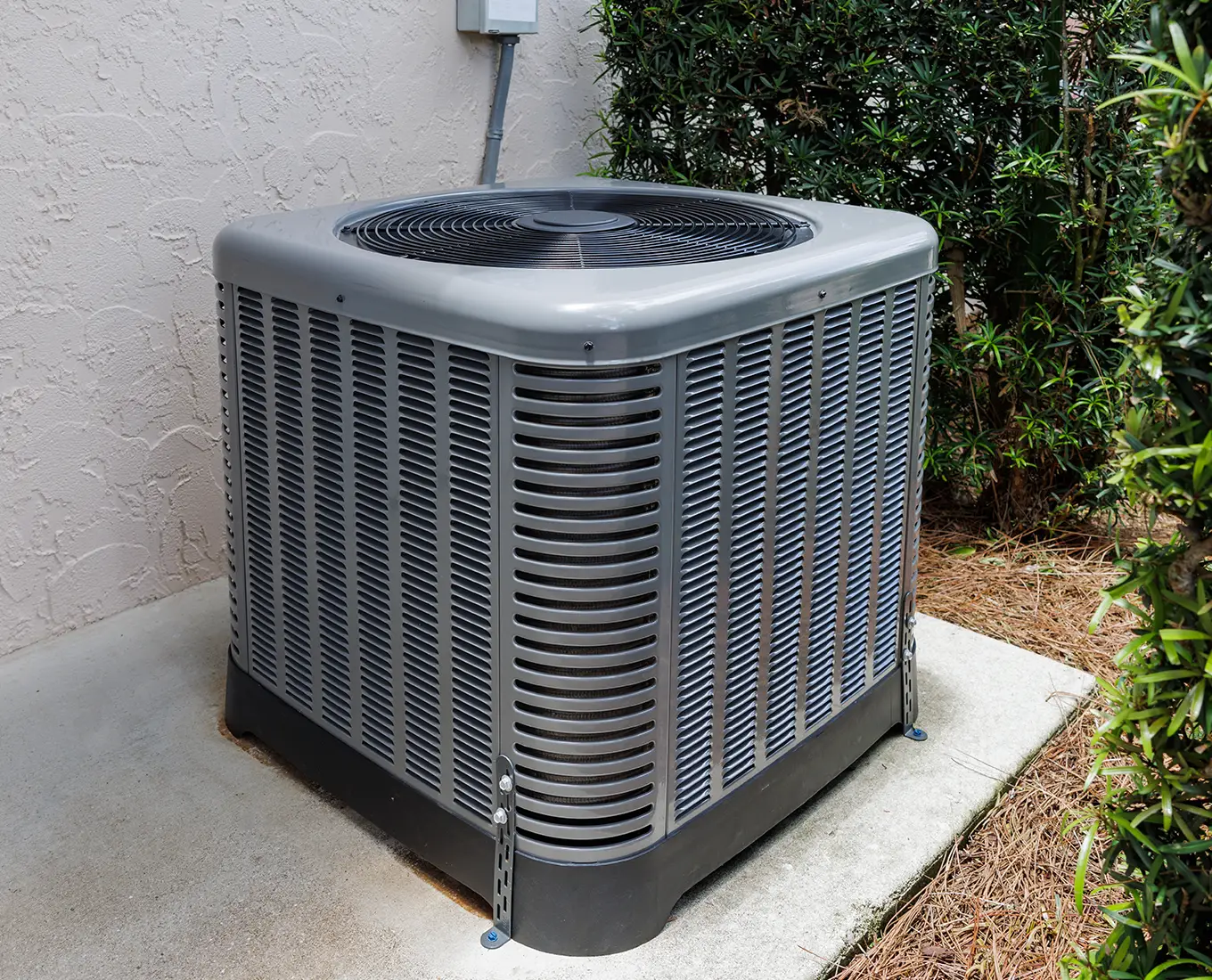 Professional AC installation and air conditioning services in Farmington, MO and throughout St. Francois County MO featuring a residential outdoor condenser unit.