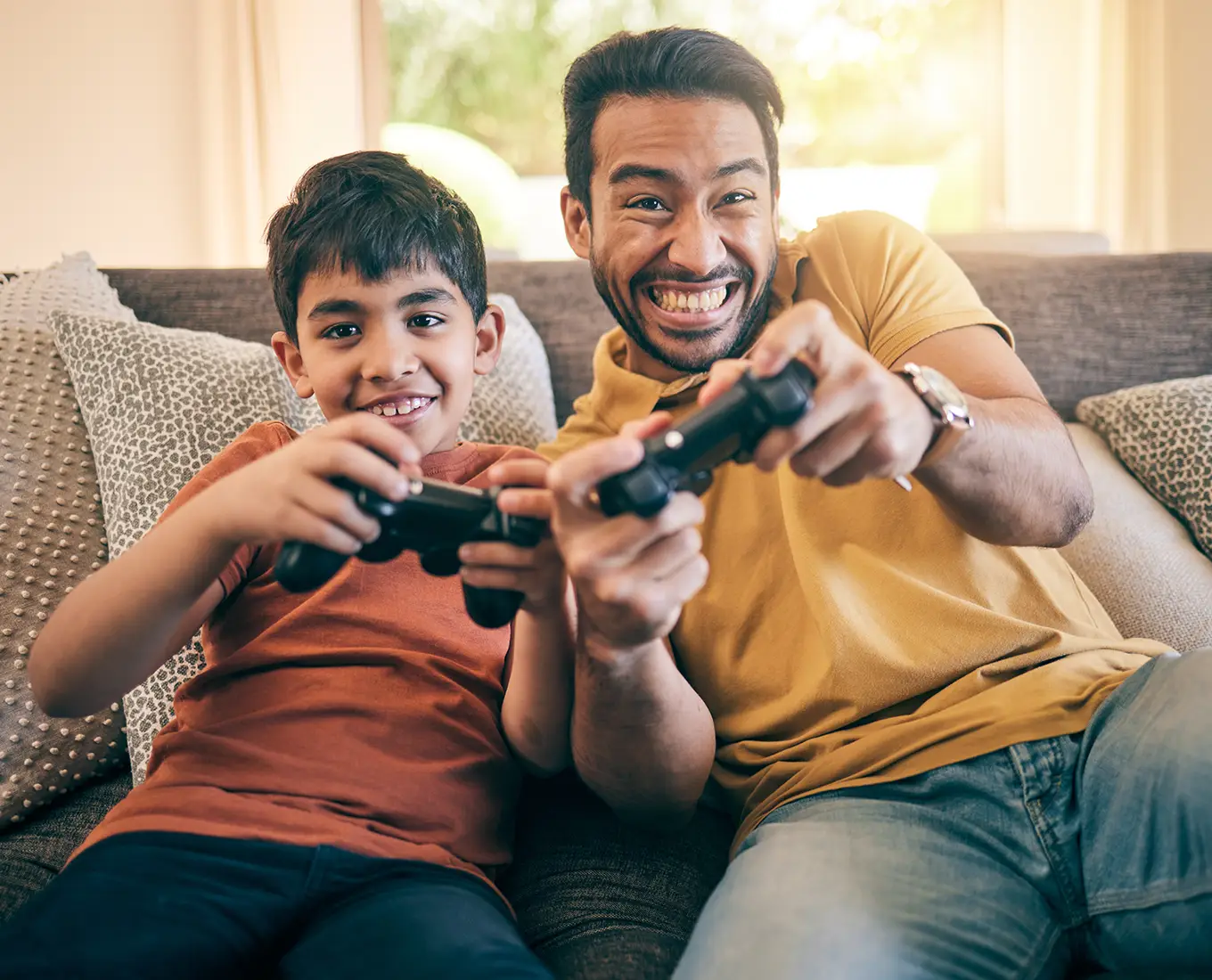 Father and son staying cool after professional AC maintenance and air conditioning tune-ups in Farmington, MO and throughout St. Francois County MO.