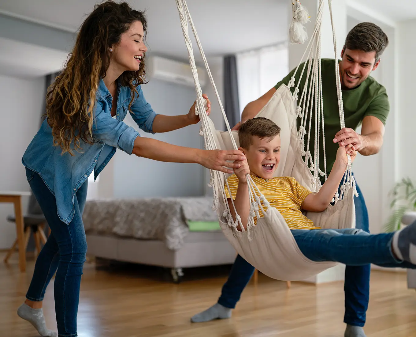 Family enjoying cool indoor comfort after professional AC repair and air conditioning troubleshooting in Farmington, MO and throughout St. Francois County MO.